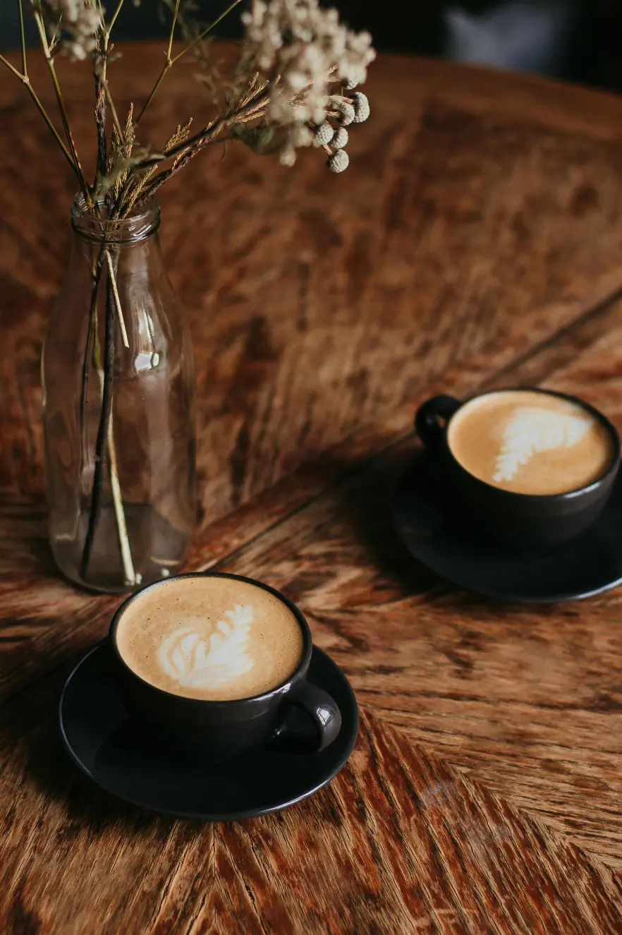 two coffee cups symbolising a conversation